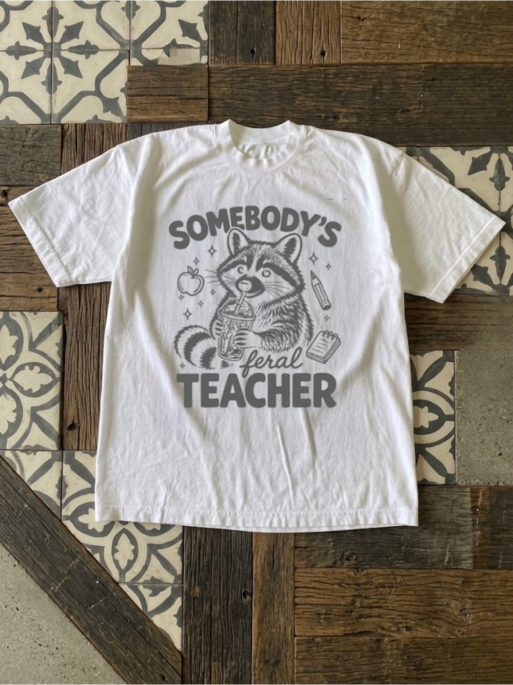 Somebodys Feral Teacher Raccoon Iced Coffee White Graphic T-Shirt